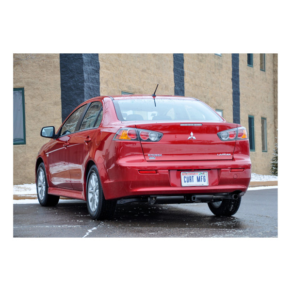 2011 - 2014 Mitsubishi Lancer Sedan, excluding Ralliart and fore to aft mufflers Curt 1-1/4", Class 1 Trailer Tow Hitch + 4-flat Wiring Kit 11479